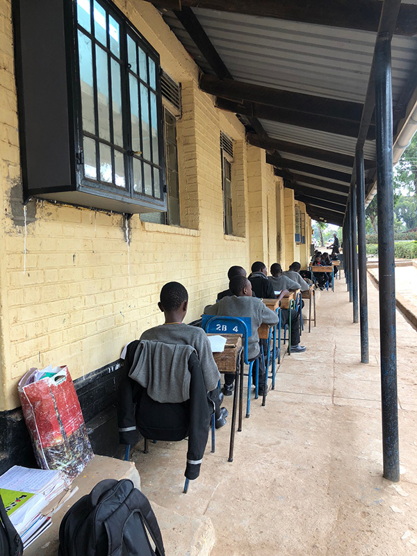 Kenyan students in outdoor classroom supported by the Budd Scholarships.